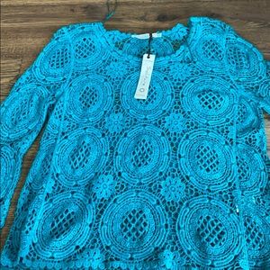 Solitaire by Ravi khosla. Lace top!